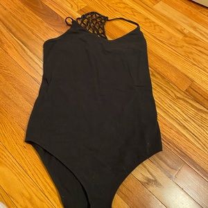 Black A&F bodysuit with fun back detailing size M